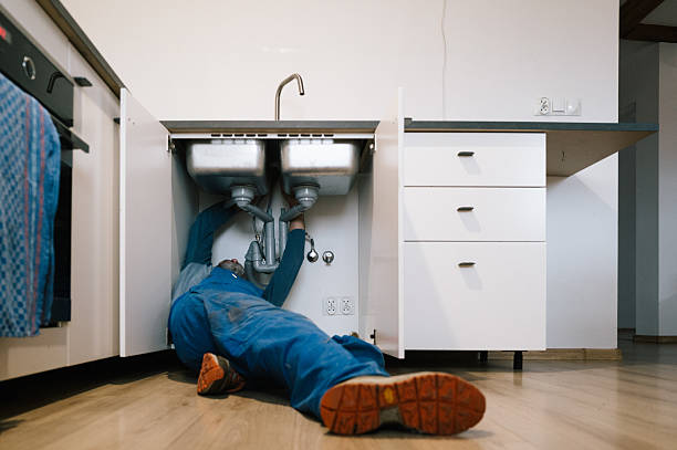 Professional Emergency Plumber technician working in Fork, MD